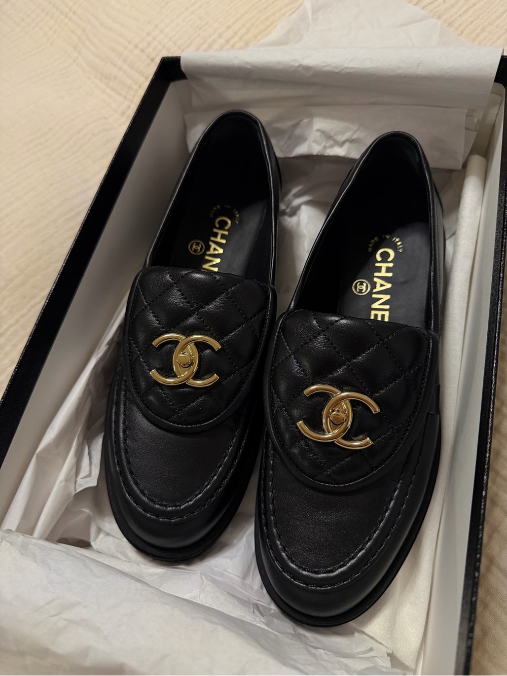 CHANEL Black Quilted Leather Loafers with Gold CC Emblem